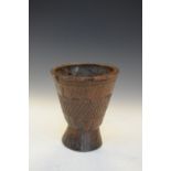 Carved tapered cylindrical African vessel, 16cm high