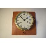 Schatz 'Royal Mariner' reproduction ship's bulkhead clock, 17cm diameter, on wooden backing