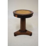 Early 19th Century rosewood adjustable height music seat having cane top, raised on canted