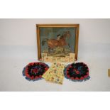 Needlepoint panel of a figure leading a horse, framed and glazed, a table decoration made from