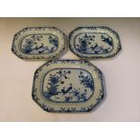 Set of three Chinese export porcelain blue and white hand painted octagonal meat dishes, 31cm wide