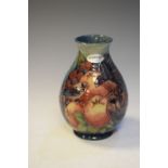 Moorcroft Bullfinch pattern baluster shaped vase, 19cm high