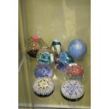 Nine glass paperweights including; Mdina, Perthshire, Isle of Wight, etc