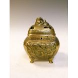 Japanese bronze koro or incense burner of rounded square form with pierced cover, the body with