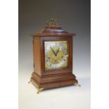 Reproduction Georgian-style mahogany bracket clock with three-train chiming movement striking on