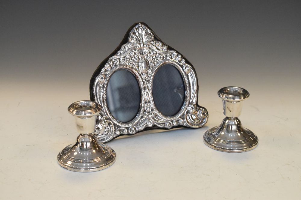 Small pair of modern silver table candlesticks, 7cm high, together with a modern silver double