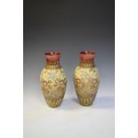 Pair of Doulton Slaters Patent vases having floral decoration, 30cm high
