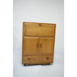 Ercol Golden Dawn elm cabinet, with fall front upper section, 82cm x 43cm x 110cm high