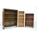 Two 20th Century oak bookcases plus another pine and mahogany, largest 91cm wide x 114cm high