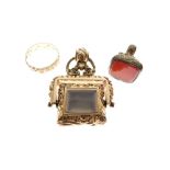 19th Century gilt metal, bloodstone and agate swivel fob seal, carnelian fob seal and yellow metal