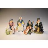 Four Royal Doulton figures - The Rag Doll Seller HN2944, The Gamekeeper HN2879, The Master HN2325