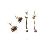 Pair of 9ct gold ear studs of cluster design, together with a pair of yellow metal drop earrings,