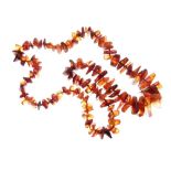Tumbled amber necklace of irregular boulder design, largest pieces approximately 28mm wide, 86g