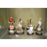 Country Artists - Eight bird ornaments on circular plinths, the tallest standing 13.5cm high