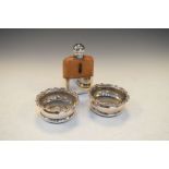 Pair of silver plated wine coasters, 8.5cm diameter and a silver plated hip flask