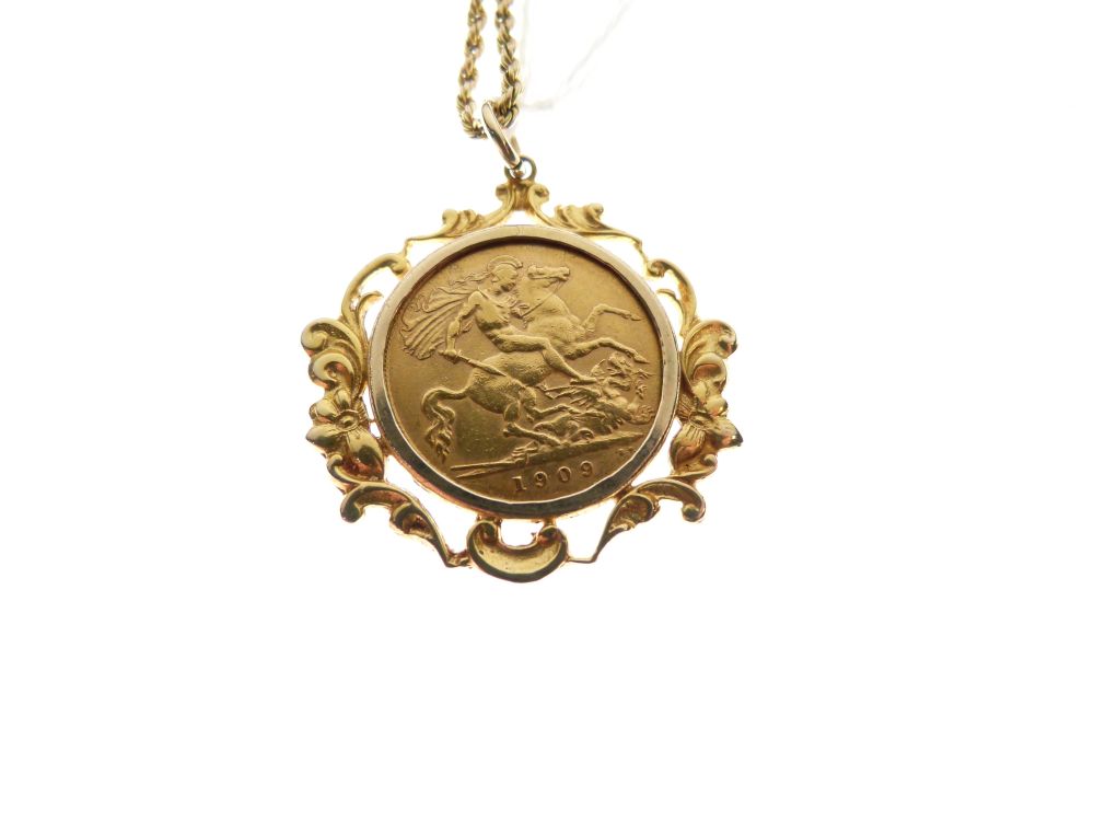 Gold Coin - Edward VII Half Sovereign 1909, in foliate scroll frame as pendant, together with a - Image 2 of 5