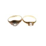 18ct gold and diamond dress ring, the gypsy-set central stone within a border of small stones,