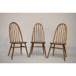 Ercol - Three circa 1970's Golden Dawn elm hoop-back dining chairs (for restoration)