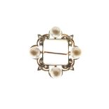 Yellow metal, diamond and seed pearl bar brooch of quatrefoil design set four pearls and twelve