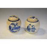 Pair of blue and white hand painted ginger jars and covers having four character mark to base,