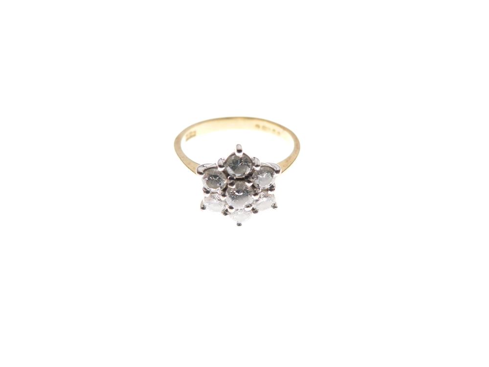 18ct gold and diamond cluster ring of seven-stone design, size K½, 2.9g gross approx