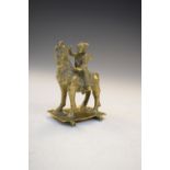 Indian bronze figure of a horseman wearing armour seated upon his horse on rectangular base, 9cm