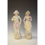 Pair of Continental bisque porcelain figures, 37cm high