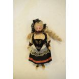 Circa 1900 bisque head doll, 13cm high