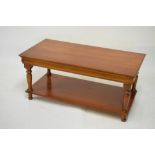 Three assorted coffee tables to include; a reproduction mahogany example, 110cm x 55cm x 49.5cm high