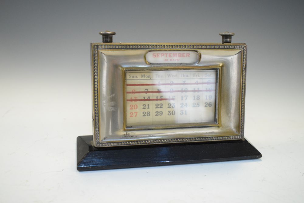 Desk top perpetual calendar having silver plated front, 15cm wide