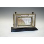 Desk top perpetual calendar having silver plated front, 15cm wide