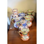 Collection of Masons and Davenport ironstone and stone china serpent design octagonal jugs, the