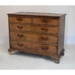 George III mahogany chest of two short over three long drawers on ogee bracket feet, 124.5cm wide