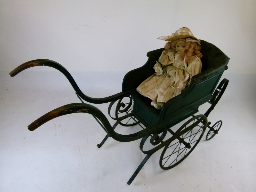 Late Victorian green painted wooden and iron perambulator (pram), with deep-buttoned hide seat- - Image 2 of 8