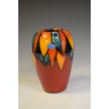 Poole Pottery concave vase decorated in the 'Harlequin' pattern, 22cm high