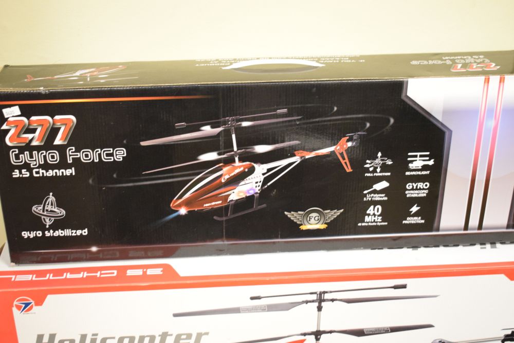 Two Wowitoys 3.5 channel H31962.4G remote control helicopters, together with 277 Gyroforce remote - Image 2 of 4