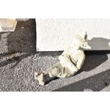 Concrete model of a sleeping elf or imp, 42cm high