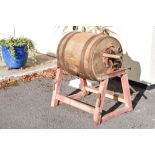 French iron-bound coopered oak butter churn on stand, 84cm wide excluding plank handle x 89cm
