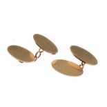 Pair of 9ct gold oval cufflinks, 8.7g approx
