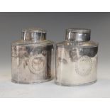 Pair of George III silver-plated tea canisters of oval section, 10.5cm high (2)