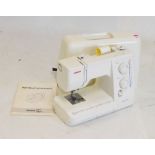 Janome model 7021 electric sewing machine with instruction booklet