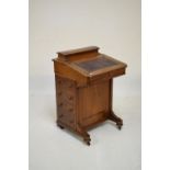 Late Victorian inlaid walnut davenport with hinged superstructure over skiver-inset fall-front