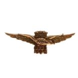 Yellow metal bar brooch with crowned eagle motif and initials RNAS for Royal Naval Air Station,