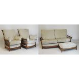 Ercol four-piece lounge suite comprising: three-seater settee, pair of chairs and a footstool, the