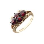9ct gold and red stone dress ring, London 1977, size N½, 4.4g gross approx