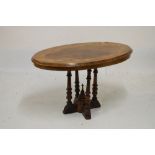 Late Victorian inlaid walnut oval occasional table with quartered top on four supports (reduced),