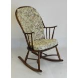 Elm stick-back rocking arm chair in the manner of Ercol