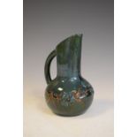 Local Interest - Elton Ware (Clevedon) pottery jug vase, having foliate decoration on a dark green