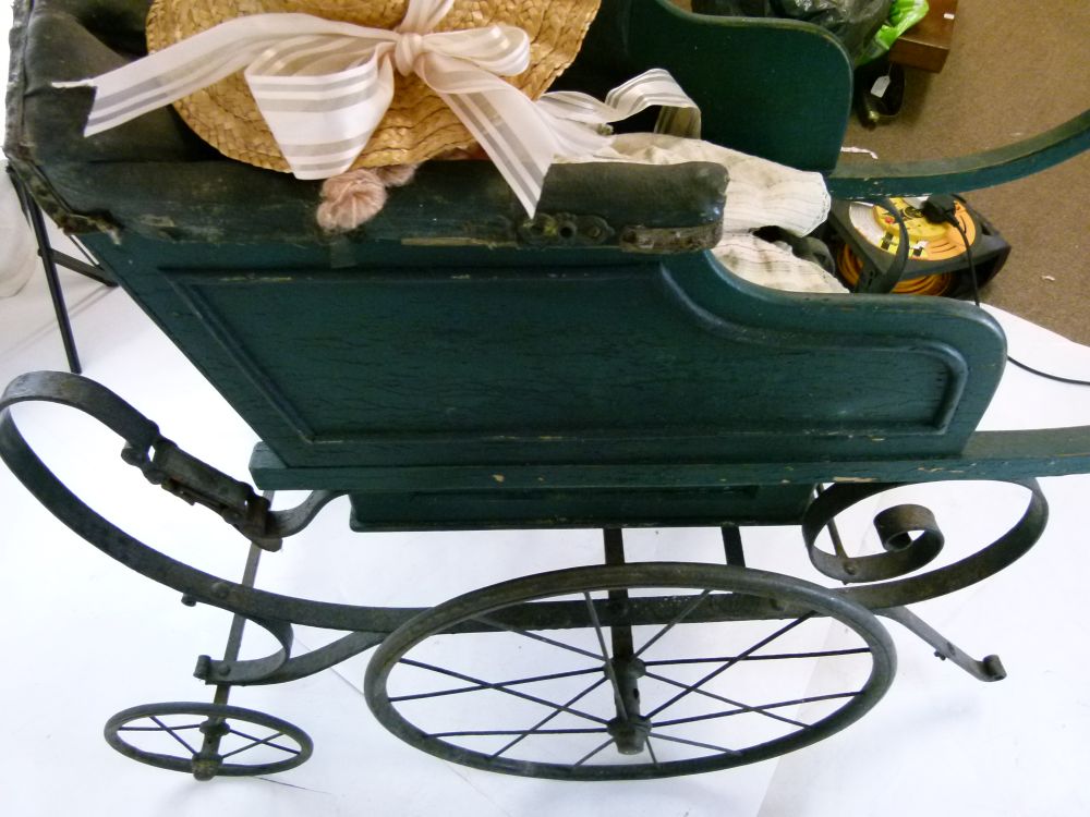 Late Victorian green painted wooden and iron perambulator (pram), with deep-buttoned hide seat- - Image 7 of 8