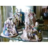 Large pair of Continental bisque porcelain figures of a courting couple, plus two figure groups (4)